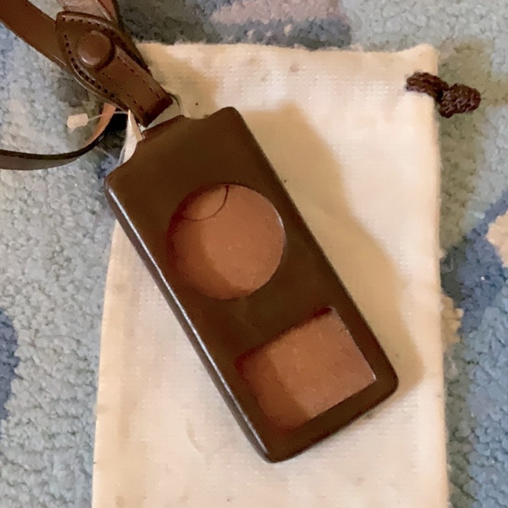 NWOT! Dooney and Burke Brown Leather iPod case. With dustbag.
